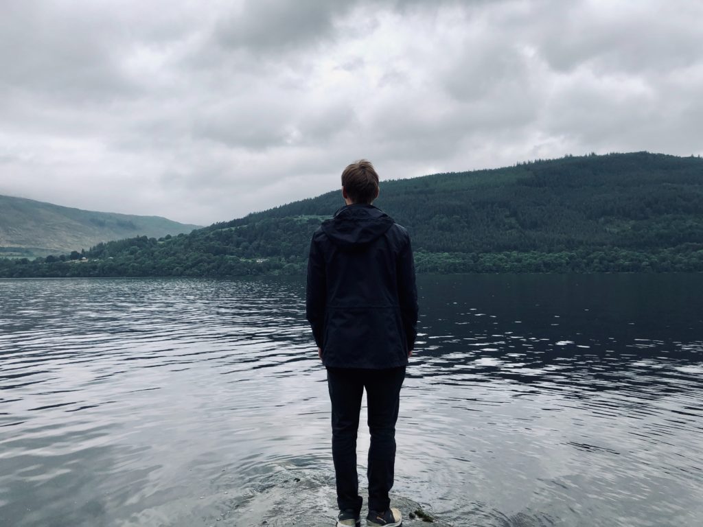 man looking out at water
Photo by Sam Carter on Unsplash