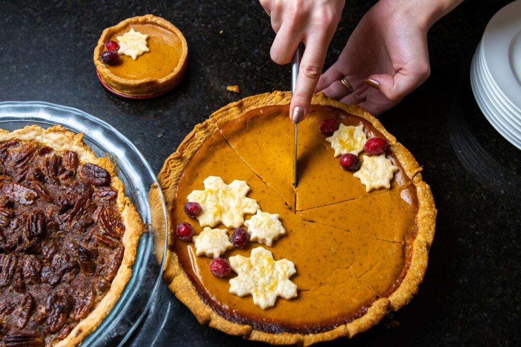 pecan pie on left and pumpkin pie on right